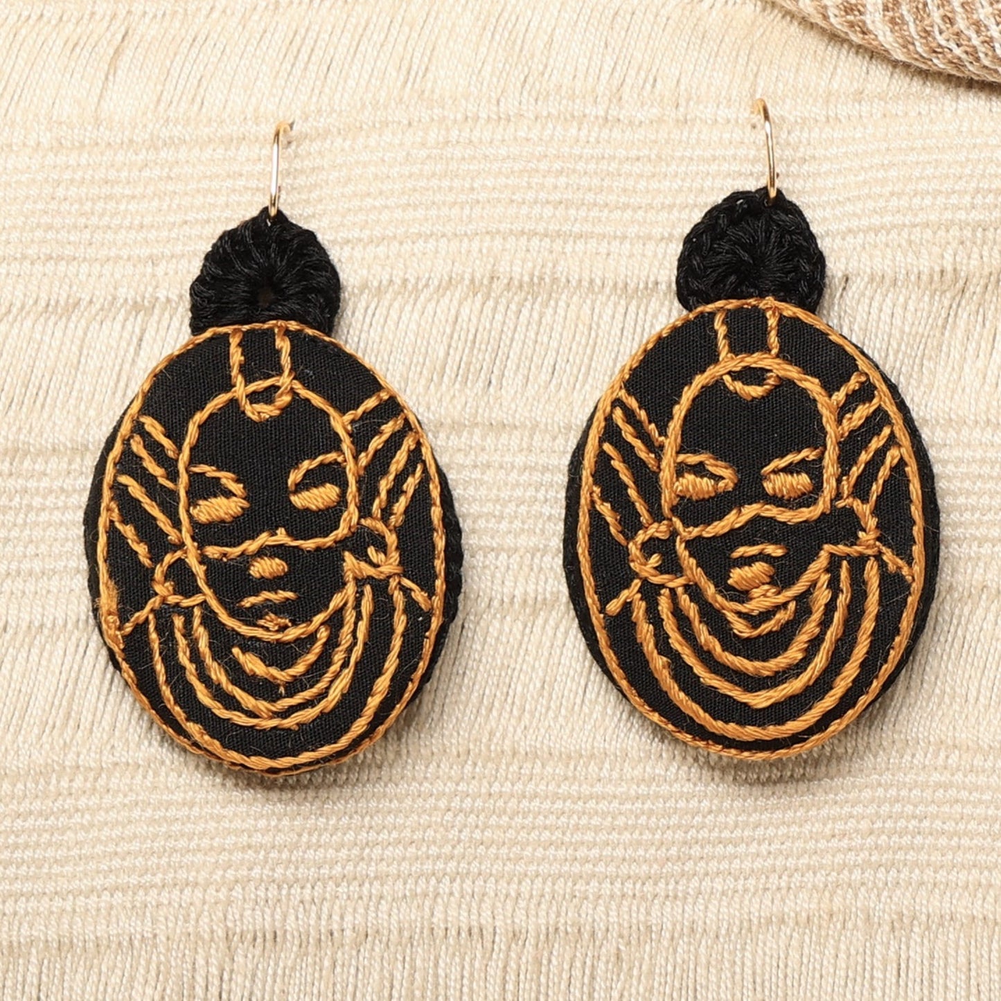 "Golden and black face" earrings