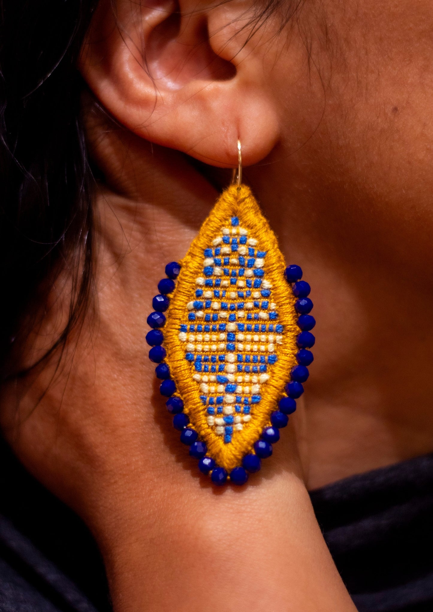Yellow and blue feather earrings